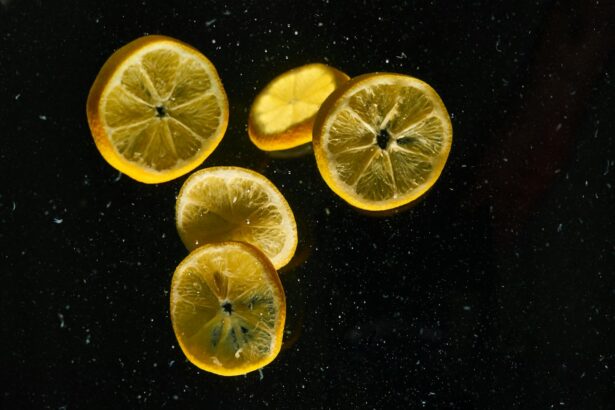 Sliced of Lemons on Black Surface