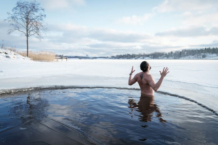 a man standing in a body of water